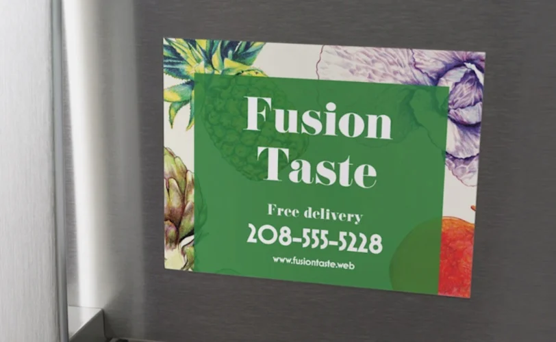 An example of a branded fridge magnet with the business' name, contact number, and website.