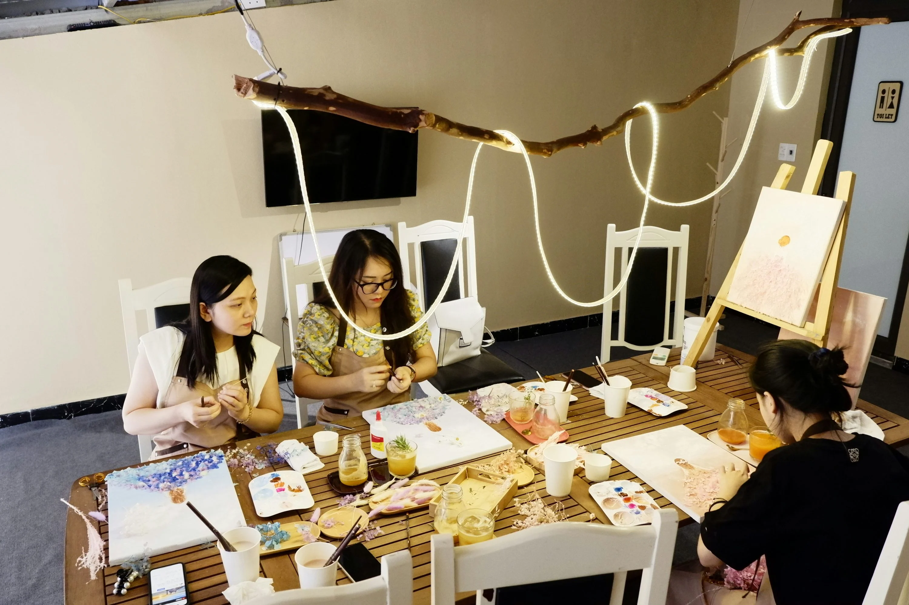 people sitting at table with food on table
