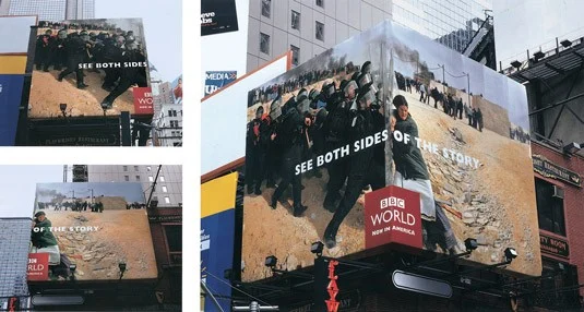 A billboard from BBC World spreading across two sides of the billboard.