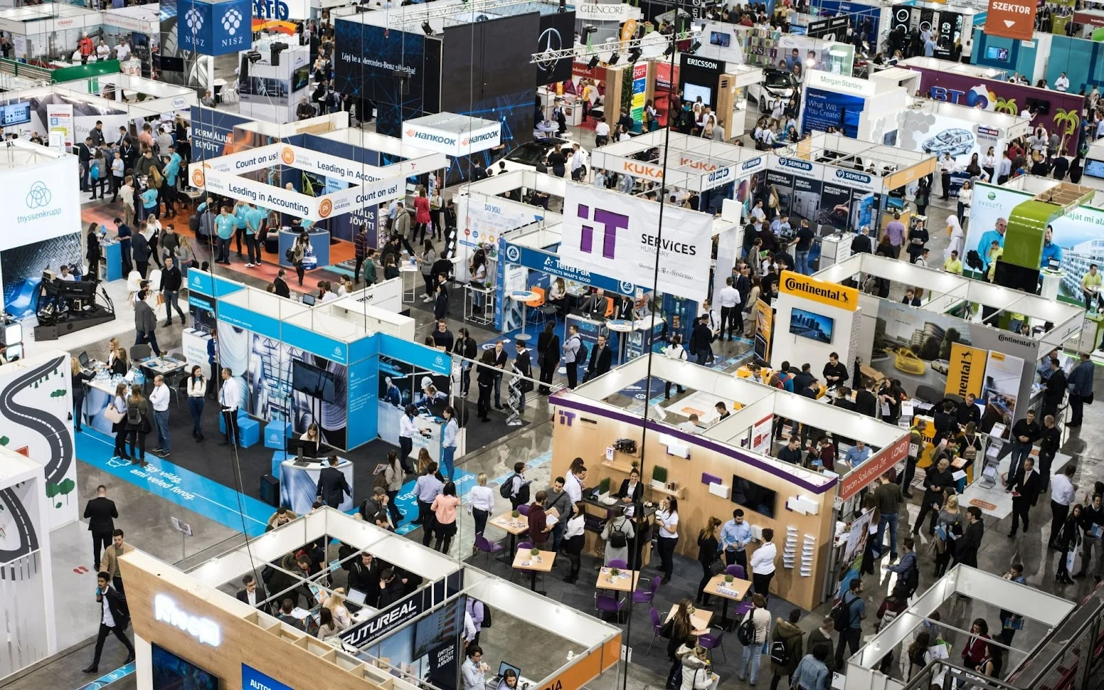 Showing a job fair packed with job seekers.