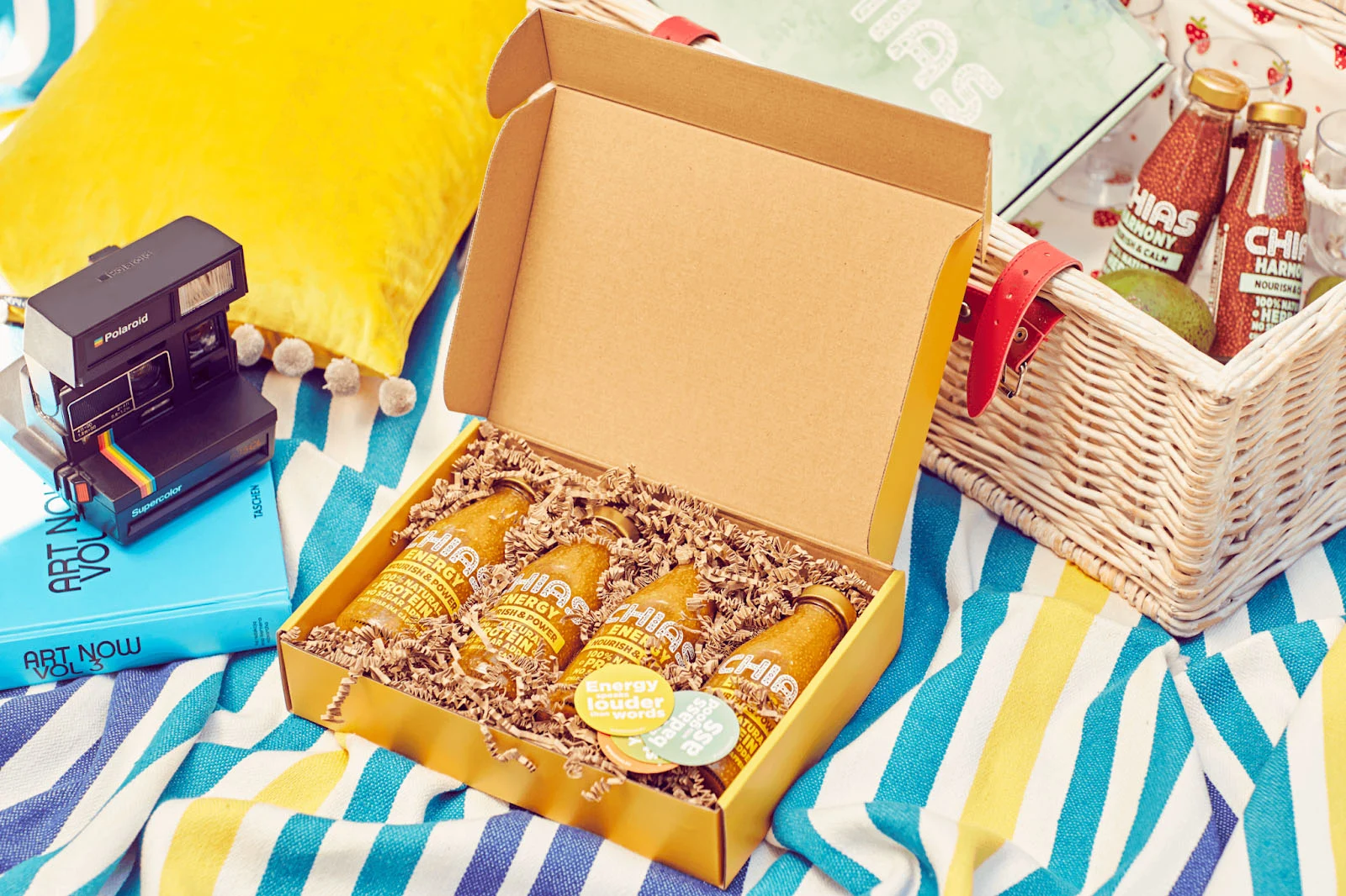 Chias unboxing experience flatlay with crinkled paper and sticker inserts.