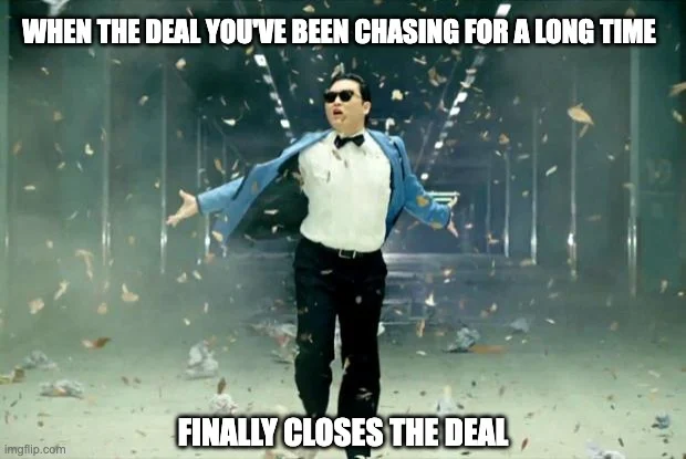 Psy looking happy after closing a deal