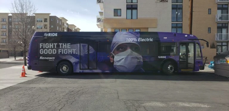 A photo of a healthcare ad on a city bus.