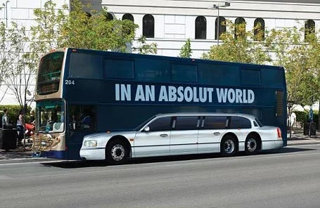 A vehicle wrap ad on a bus from Absolut.