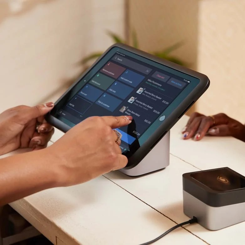 POS hardware with touch-screen monitor.