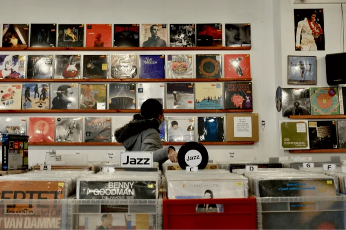 Woman perusing a record store